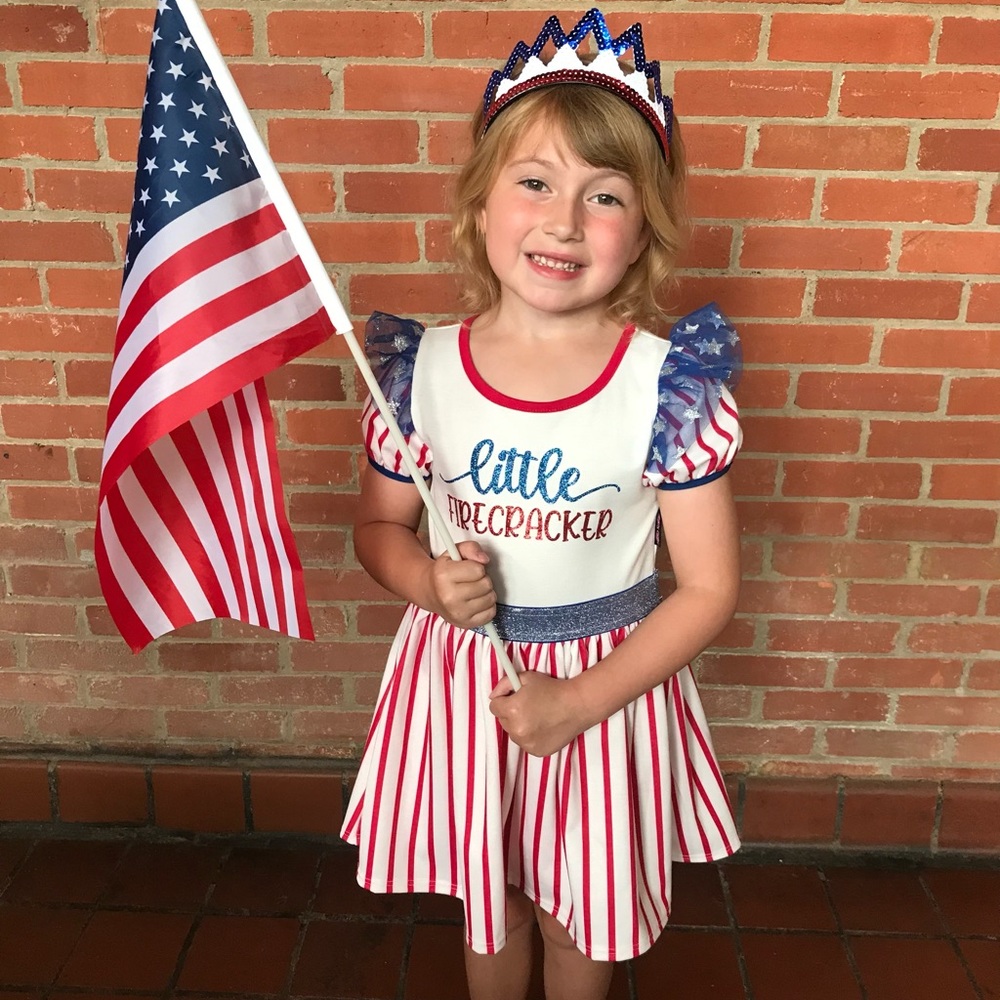 Little firecracker dress. Size 6-8. Has flaws, cute patriotic dress.